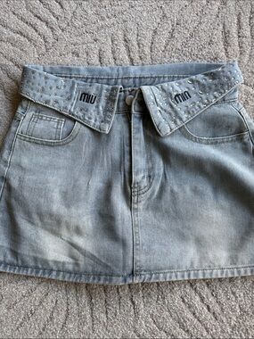 “Miu Miu” Light Blue Denim Mini Skirt with Studded Crystal Embellishments